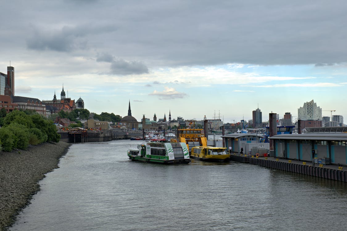 free-photo-of-rain-cloud-over-river-in-city